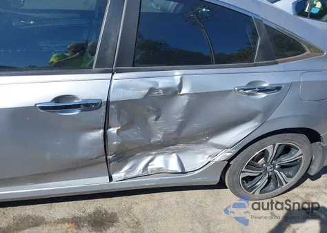 2016 Honda Civic Touring z USA, uszkodzony, nr VIN 19XFC1F96GE019473